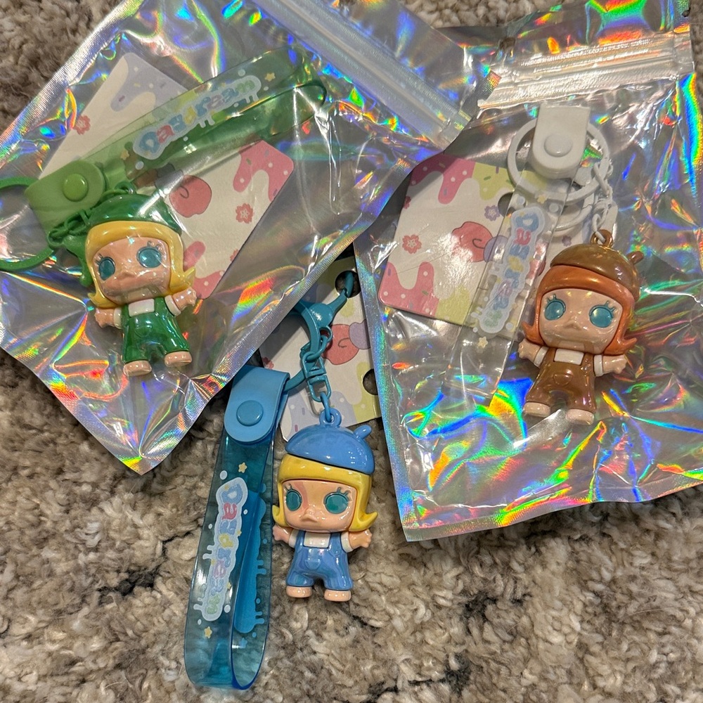 Iridescent Molly Keychains! - Blue, Green,Brown. Sold separately. 🌼 shines nice!